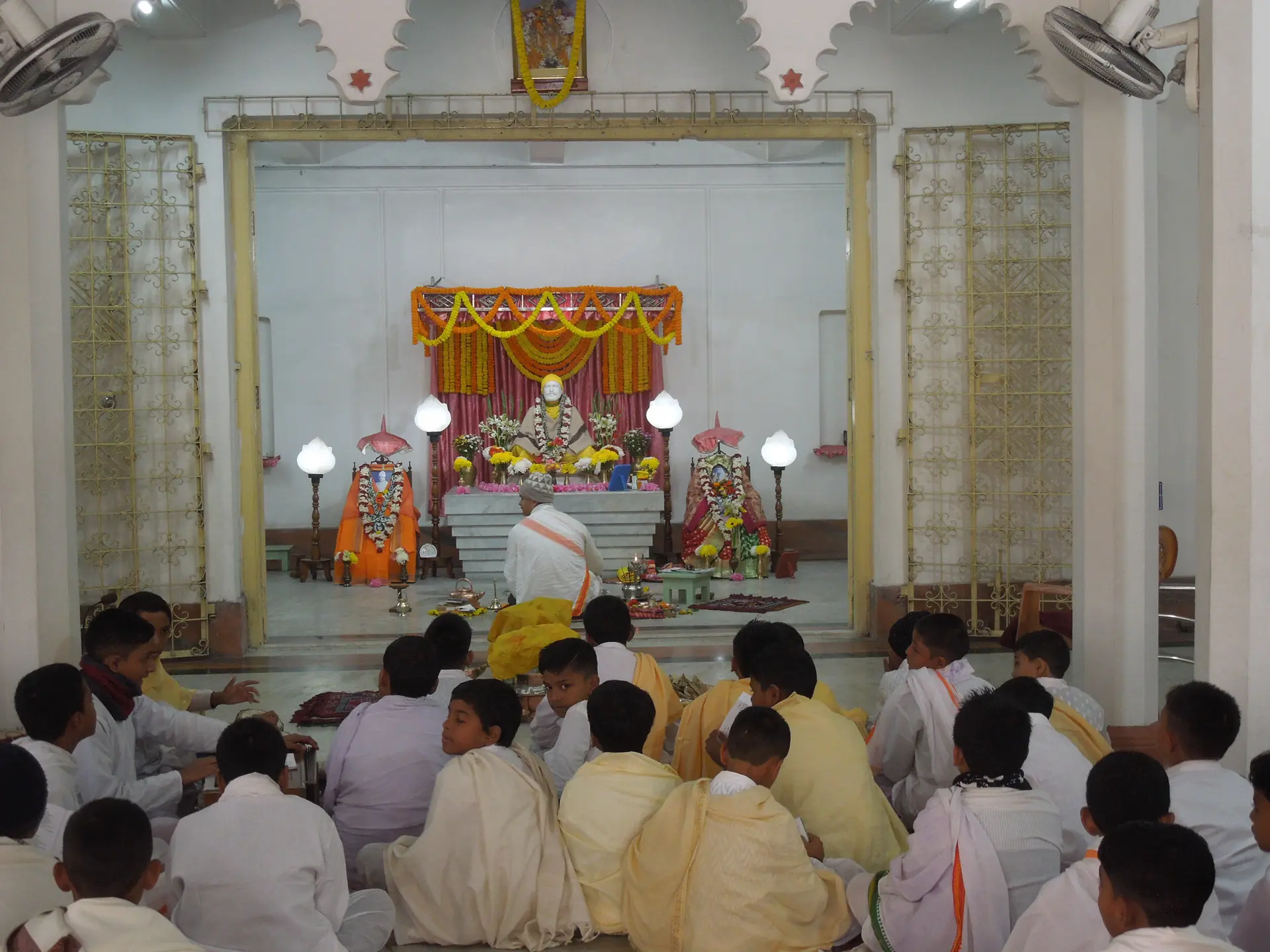Devotees seated in the shrine of Ramakrishna Math, Coochbehar